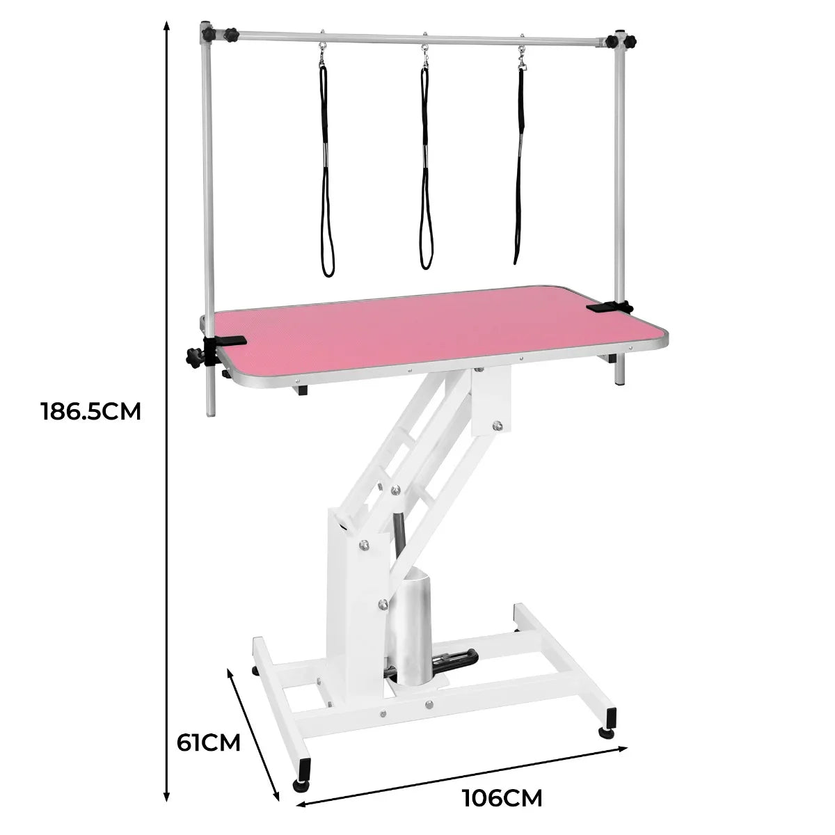 White hydraulic grooming table with a pink top, adjustable height, and three overhead restraints for pet grooming stability