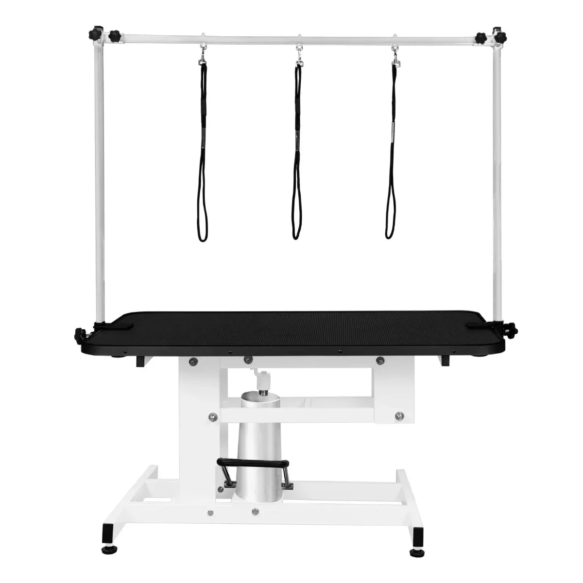 White hydraulic grooming table with a black textured tabletop, adjustable height, and three overhead grooming loops for pets
