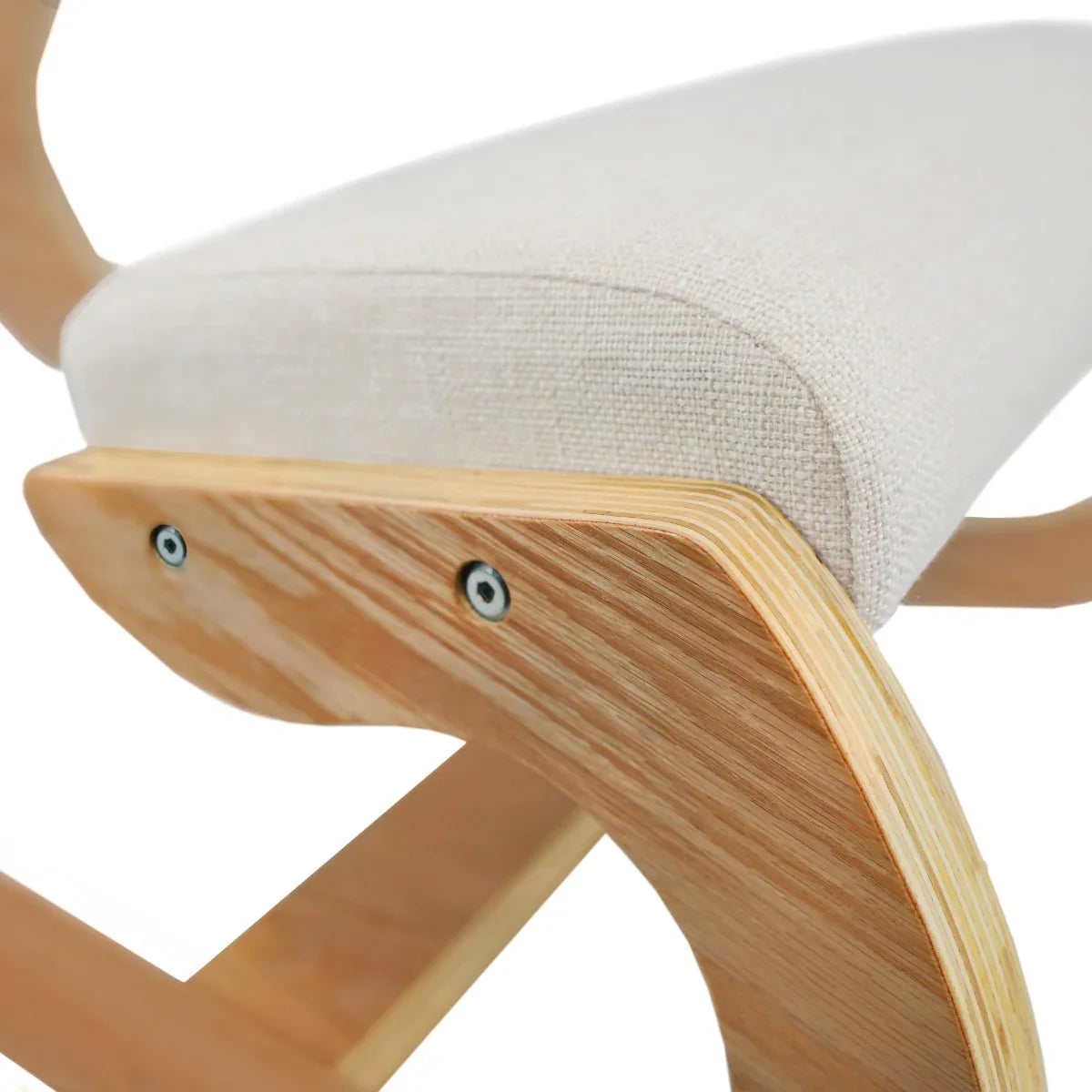 Ergonomic kneeling chair featuring a soft beige fabric cushion and a natural wood frame with curved design for comfort and support
