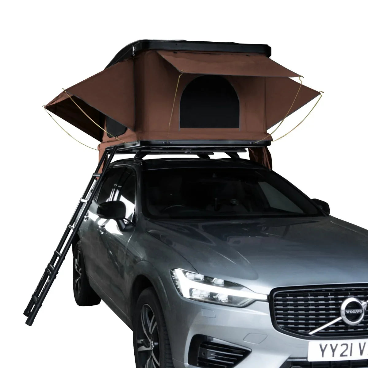 Brown car roof tent mounted on a silver SUV, featuring a spacious interior, large windows, and a sturdy ladder for easy access