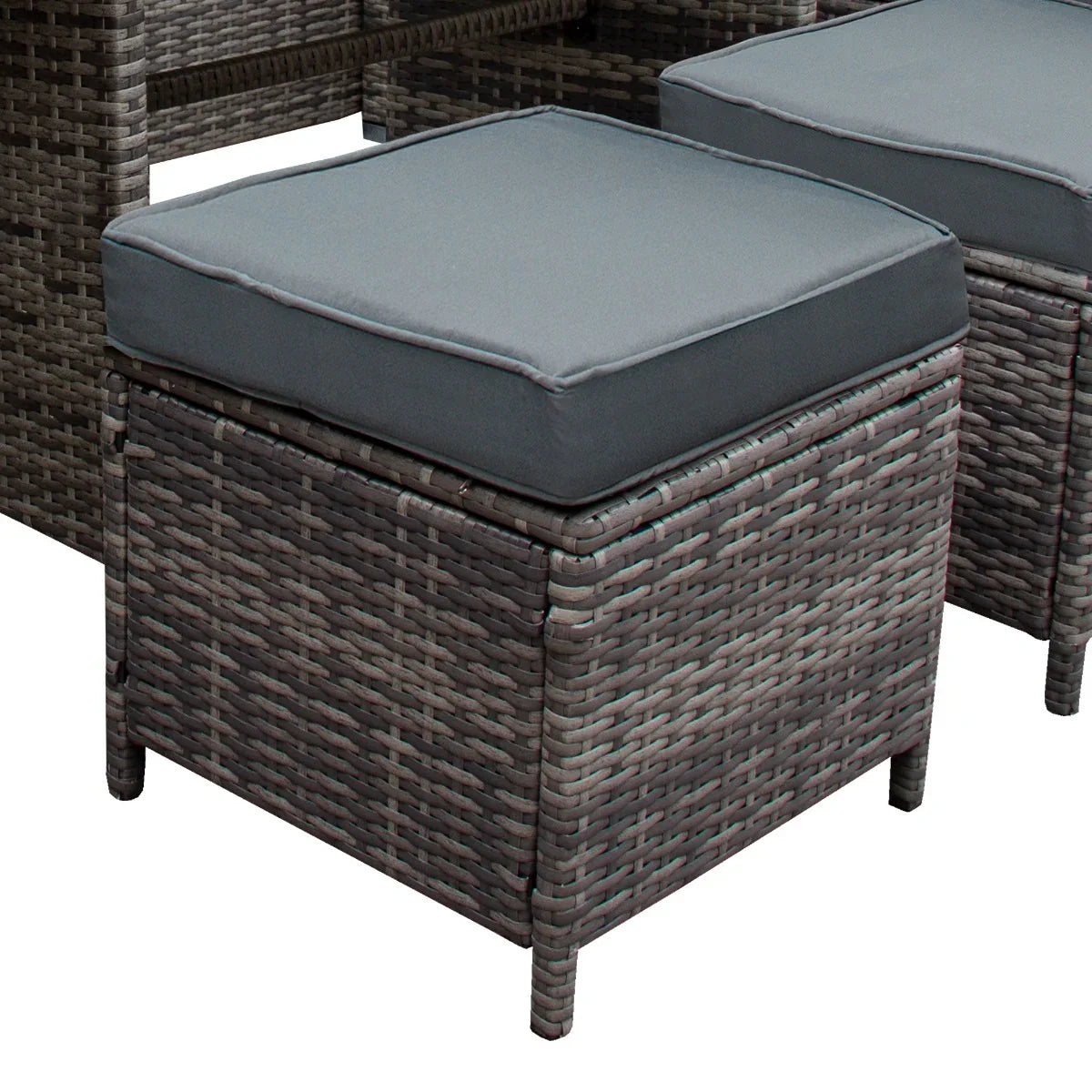 Grey cushioned ottoman from the rattan corner set, featuring a woven texture and sturdy design, perfect for outdoor seating and storage