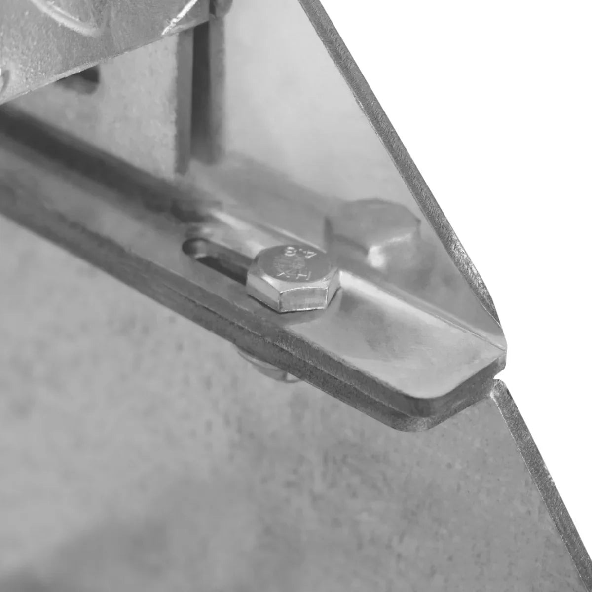 Close-up of the adjustable galvanized staircase's metal joint, showcasing the sturdy bolt and smooth, durable finish