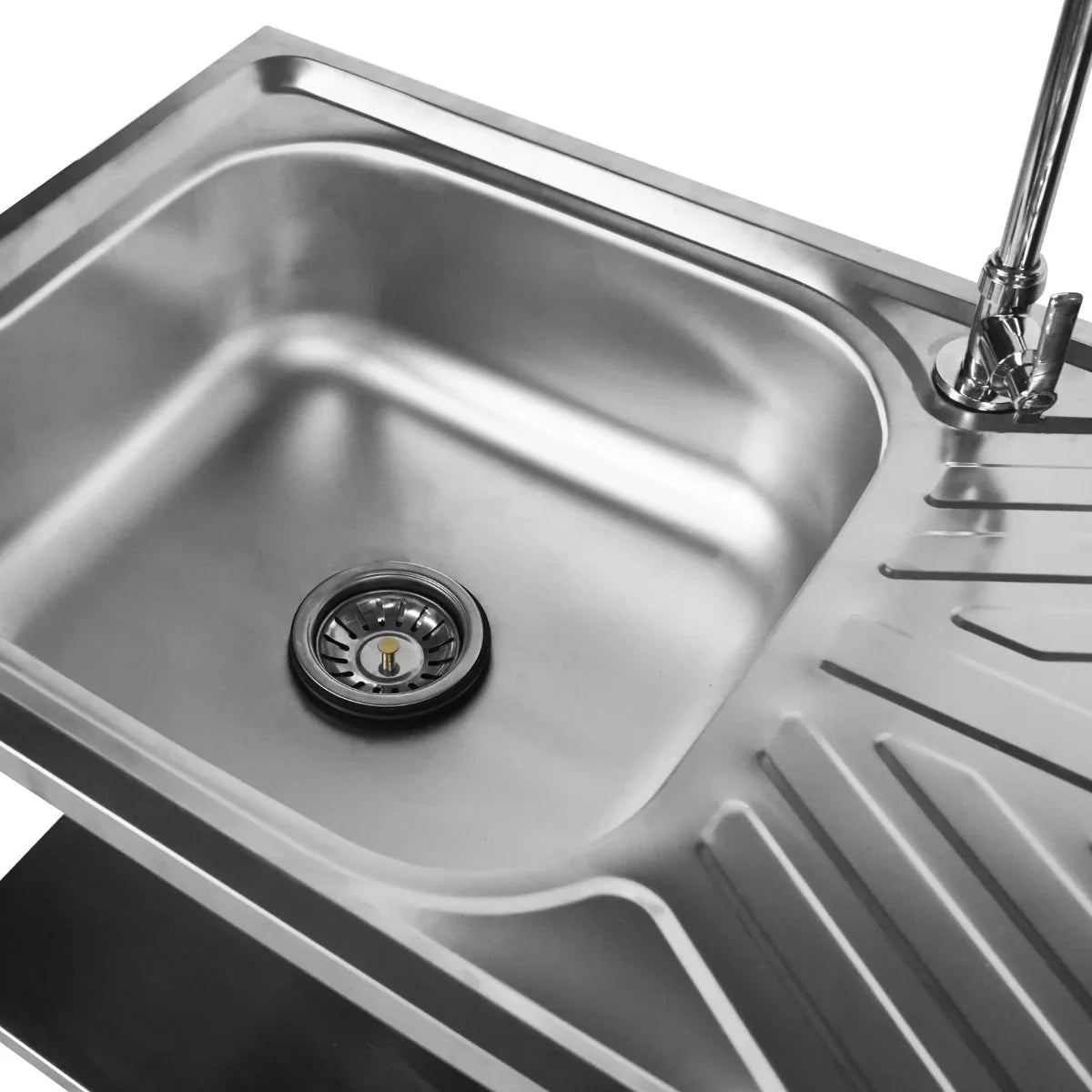 Stainless steel folding camping sink with a smooth basin, ribbed surface for drainage, and a chrome faucet for easy outdoor use
