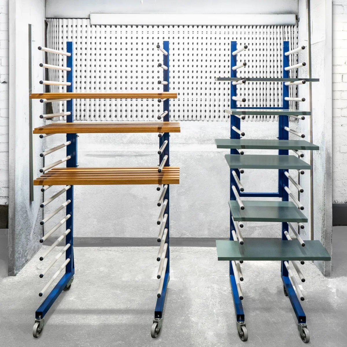 Combi Spray Drying Rack Trolley set with four adjustable shelves in wood and glass, featuring a sturdy blue metal frame on wheels