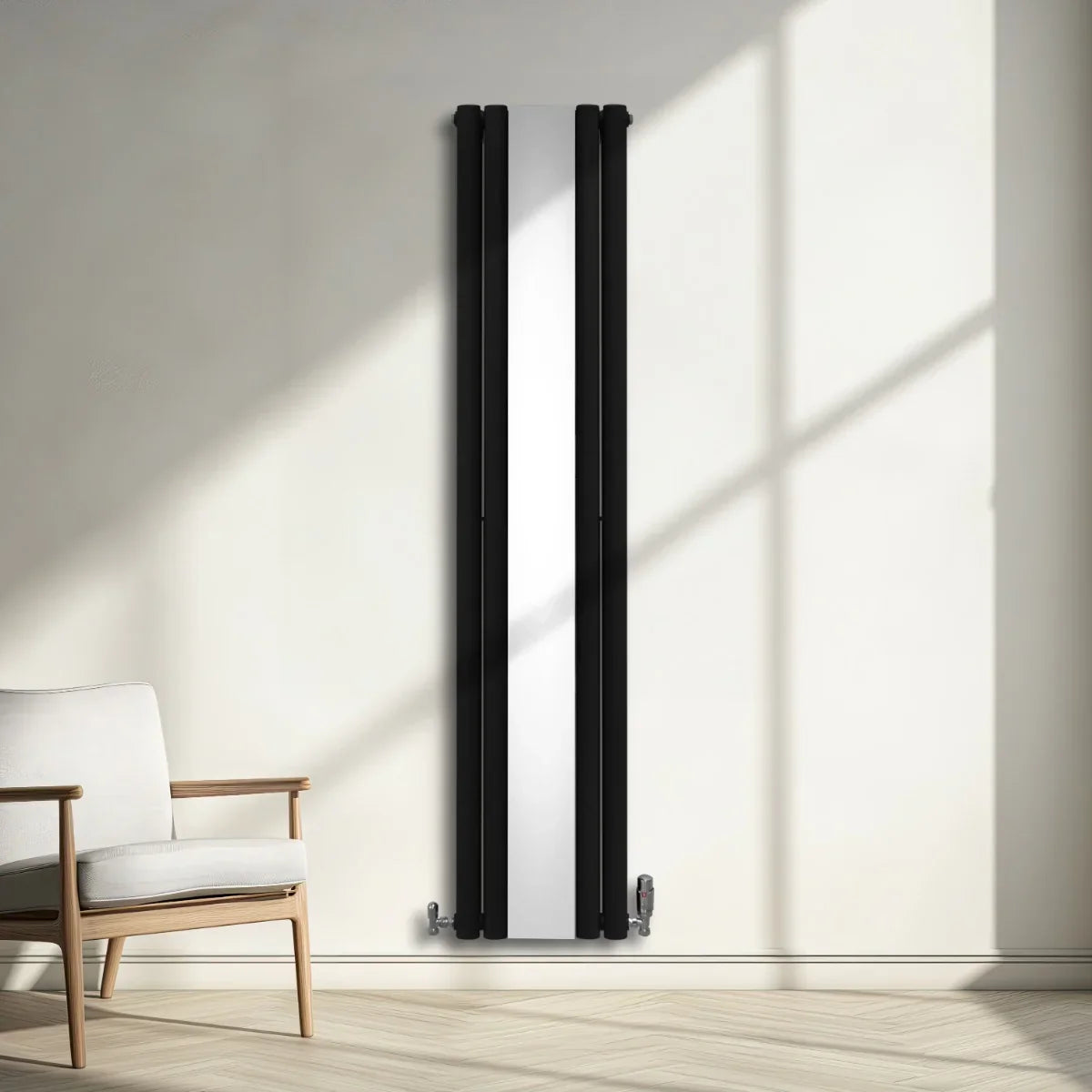 Sleek black oval mirror radiator, 1800mm x 380mm, mounted on a light wall, enhancing modern decor with a minimalist design