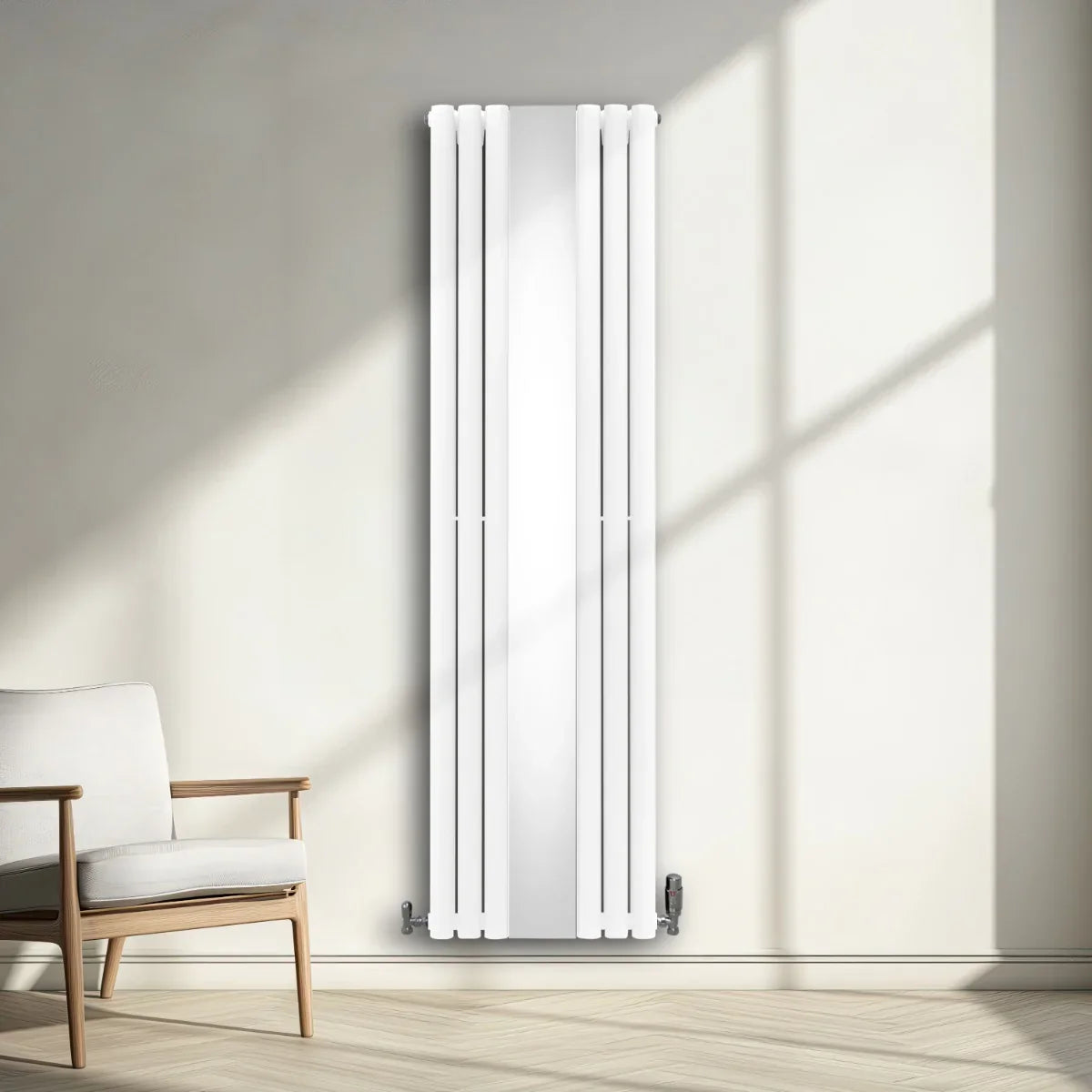 Sleek white oval mirror radiator, 1800mm x 500mm, featuring a modern design, mounted on a wall beside a cozy chair in a sunlit room