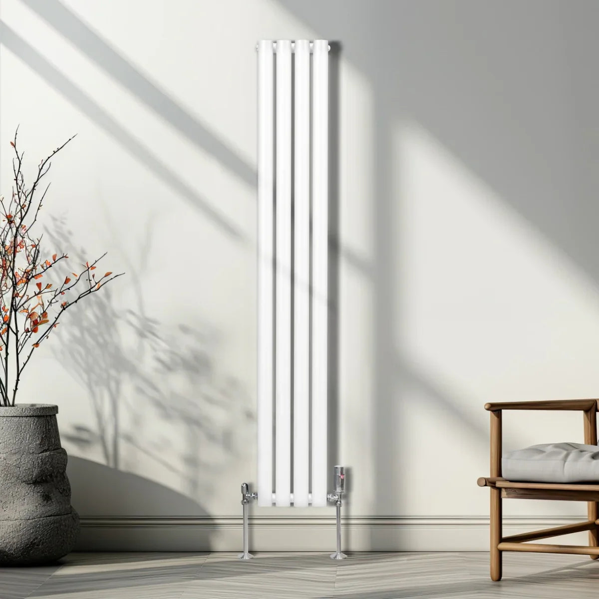 Sleek white oval column radiator, 1600mm x 240mm, mounted on a wall, with a modern design and elegant chrome valves, enhancing a stylish interior