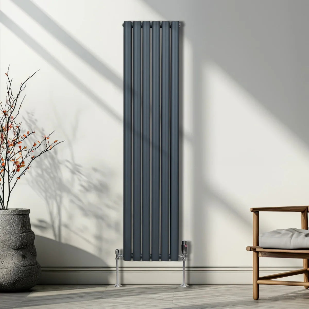Oval column radiator in anthracite grey, 1600mm x 360mm, featuring sleek vertical lines and a modern design, enhancing any room's decor