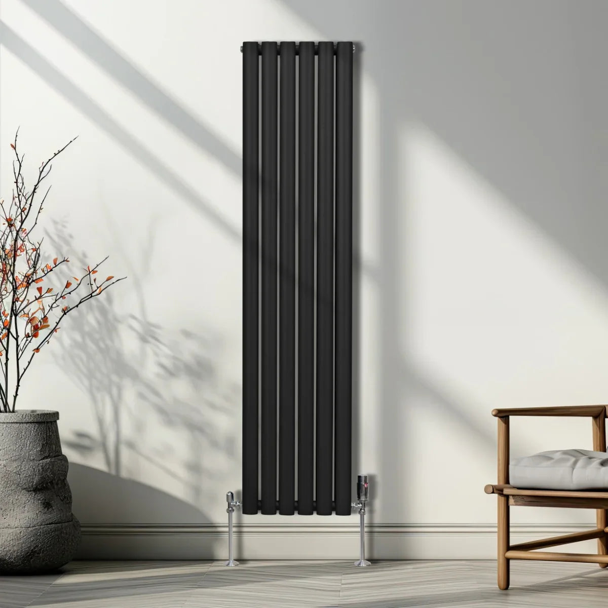 Sleek black oval column radiator, 1600mm x 360mm, featuring vertical bars and modern design, enhancing contemporary interiors