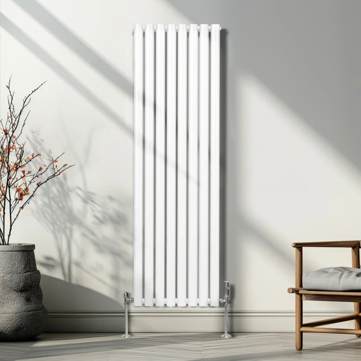 Sleek white oval column radiator, 1600mm x 480mm, featuring vertical bars and a modern design, mounted against a light wall
