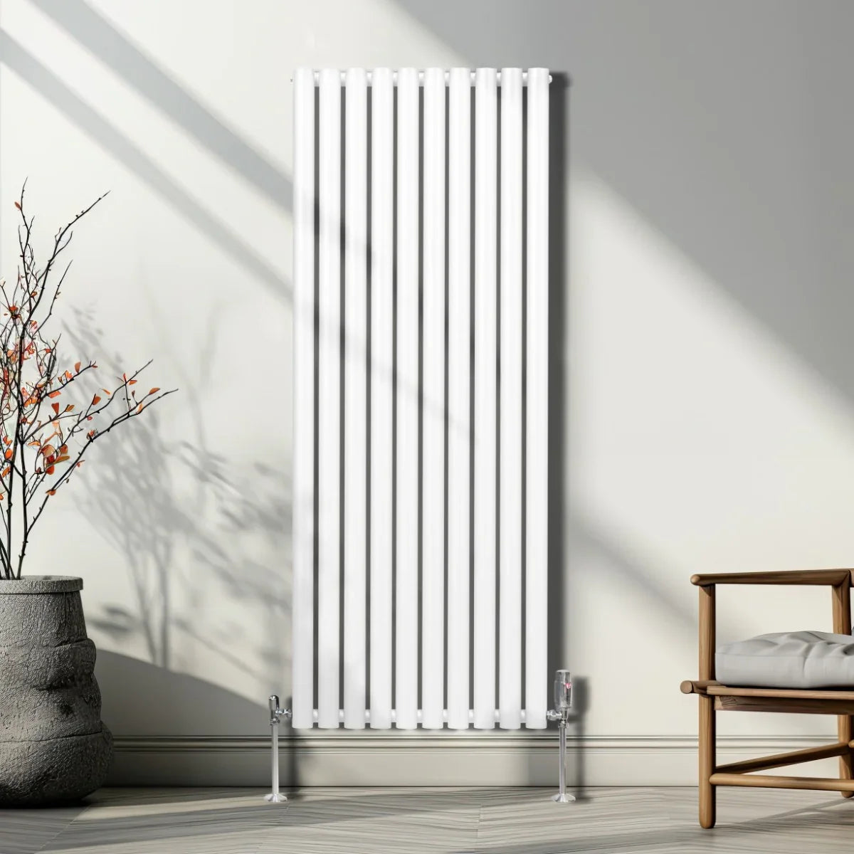 Sleek white oval column radiator, 1600mm x 600mm, featuring vertical lines and a modern design, enhancing a stylish interior space