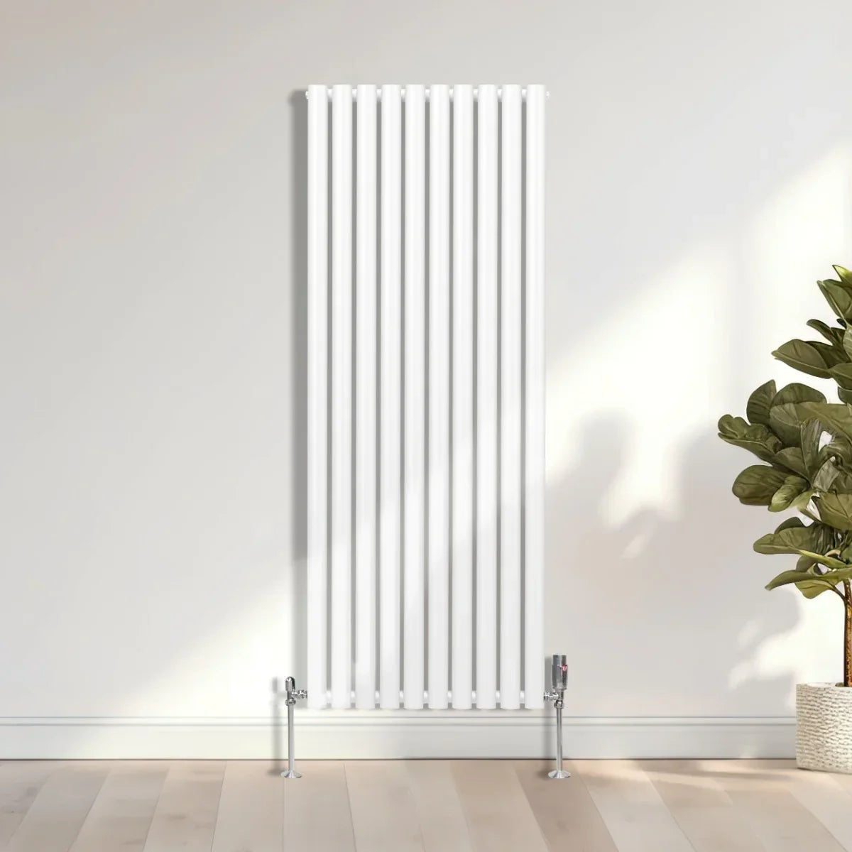 Sleek white oval column radiator, 1600mm x 600mm, featuring vertical bars and a modern design, mounted on a light wooden floor