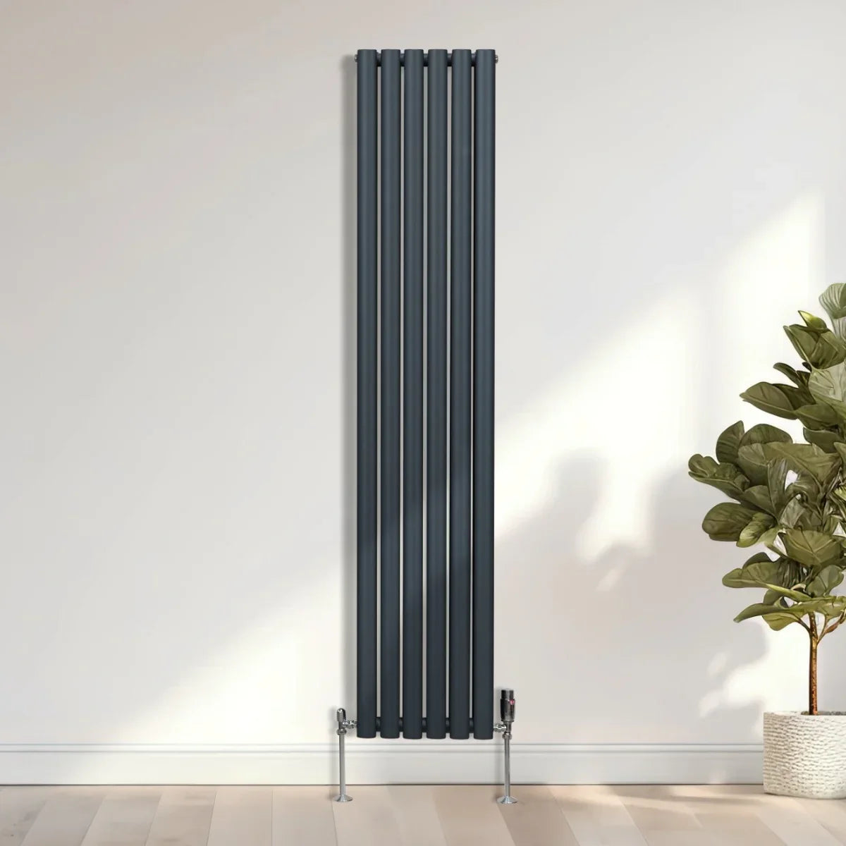 Oval column radiator in anthracite grey, 1800mm x 360mm, featuring sleek vertical lines and a modern design, perfect for contemporary spaces