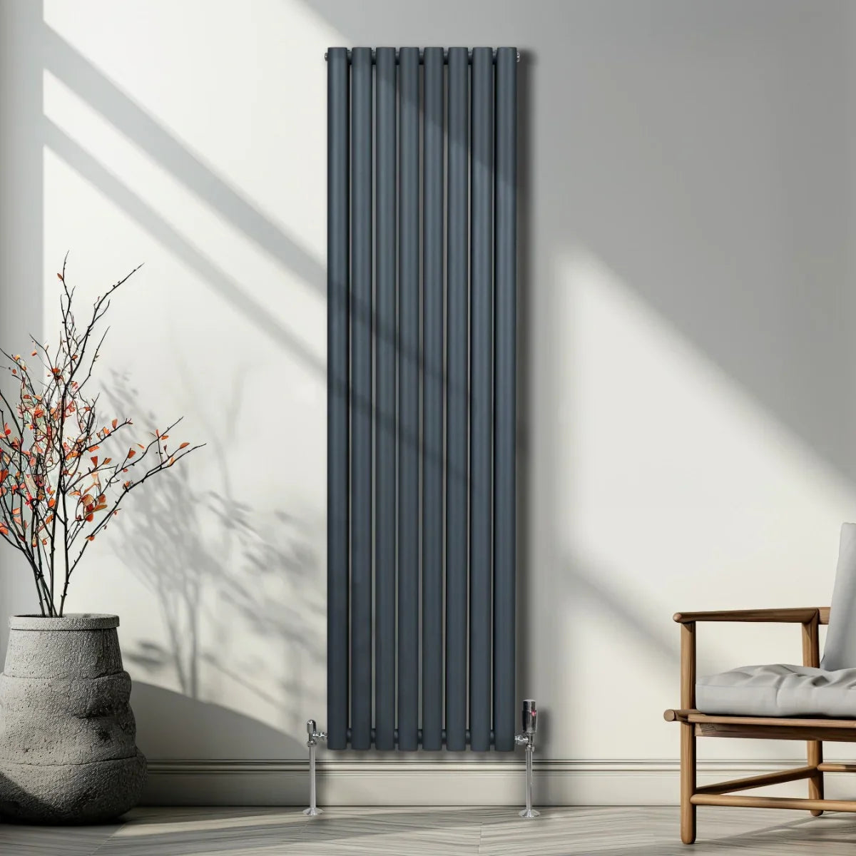 Oval column radiator in anthracite grey, 1800mm x 480mm, featuring sleek vertical lines and a modern design, mounted on a wall