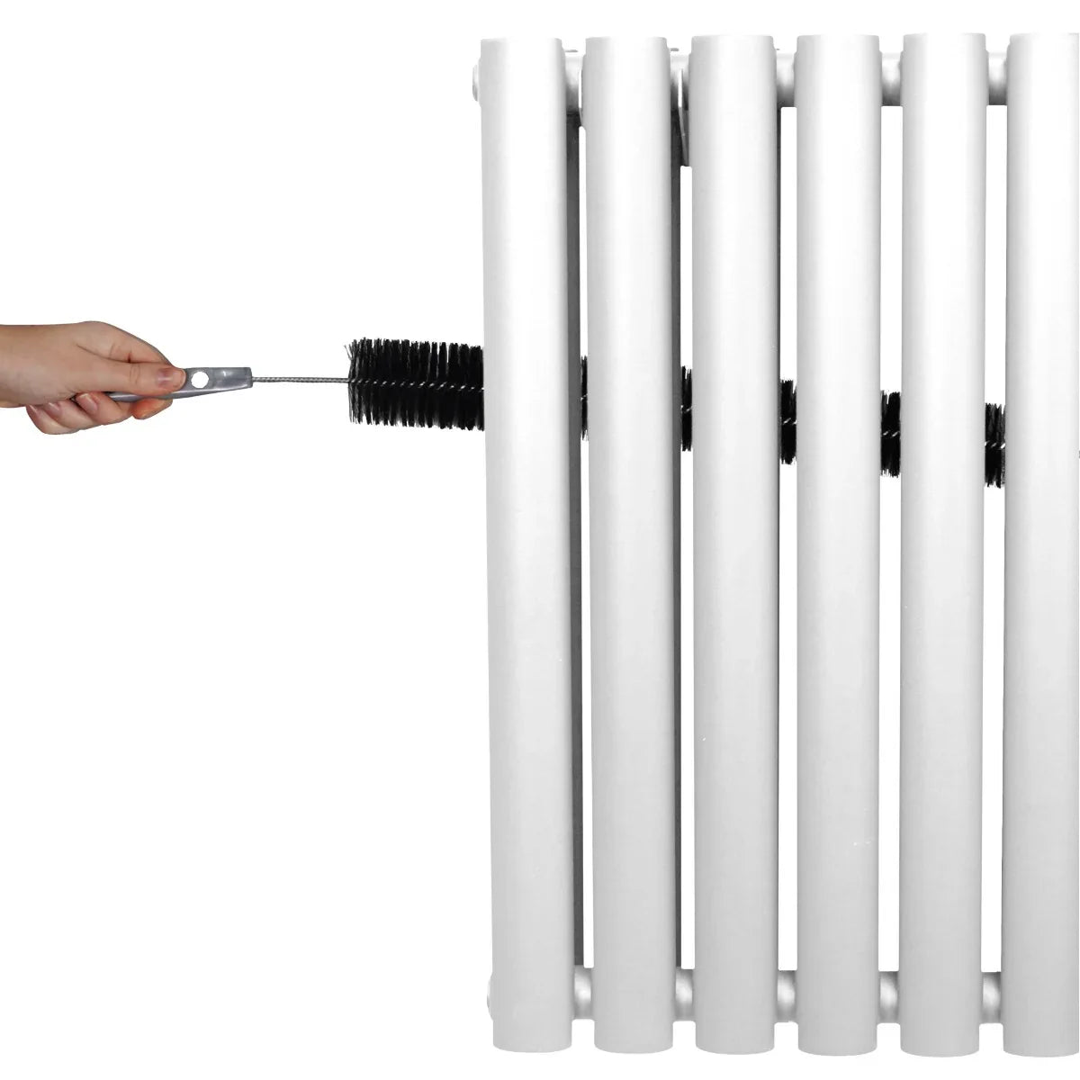 White oval column radiator with a hand adjusting the valve, showcasing its sleek design and smooth finish, ideal for modern interiors