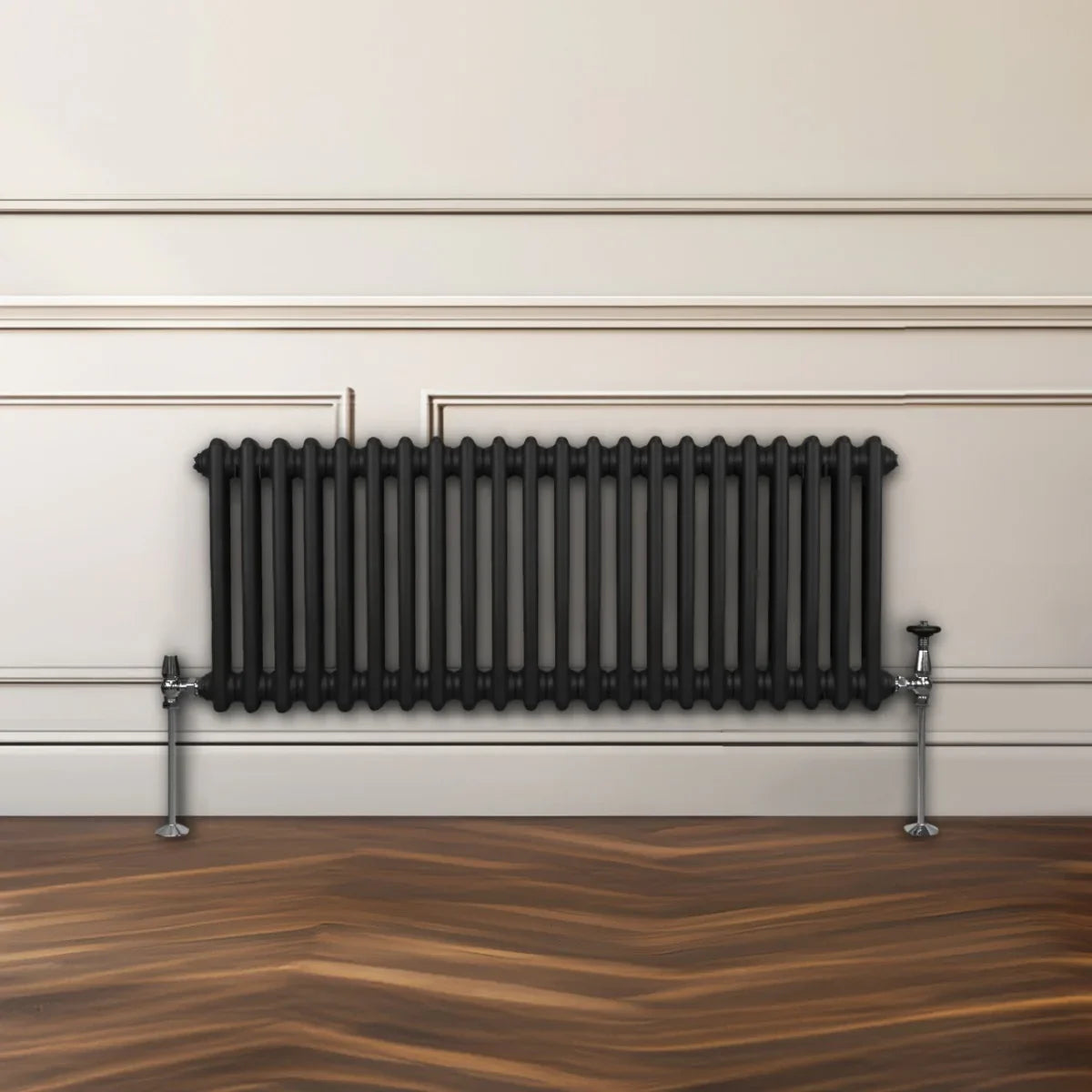 Traditional black 2 column radiator, 300 x 1012mm, featuring a sleek design with vertical tubes and polished chrome valves, mounted on a wooden floor