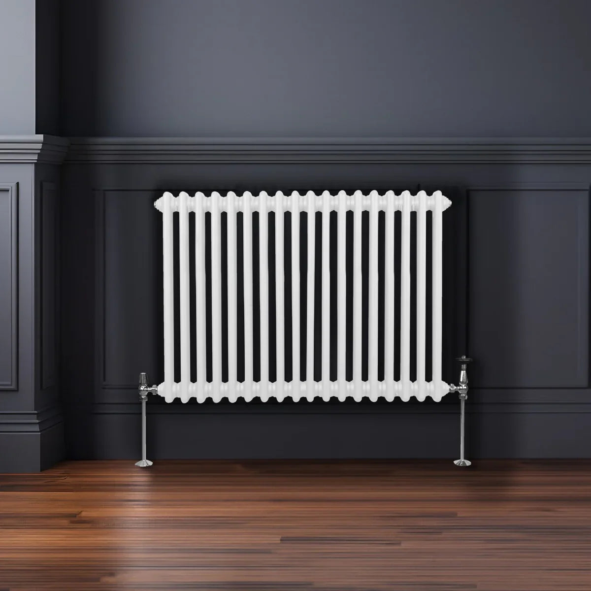 Traditional 2 column radiator in white, featuring a sleek design with vertical fins, mounted against a dark wall, enhancing modern interiors