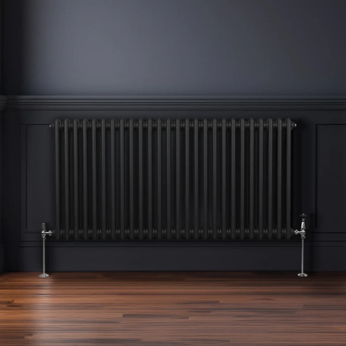 Traditional black 2 column radiator, 600 x 1192mm, featuring a sleek design with vertical bars and polished chrome feet, set against a dark wall