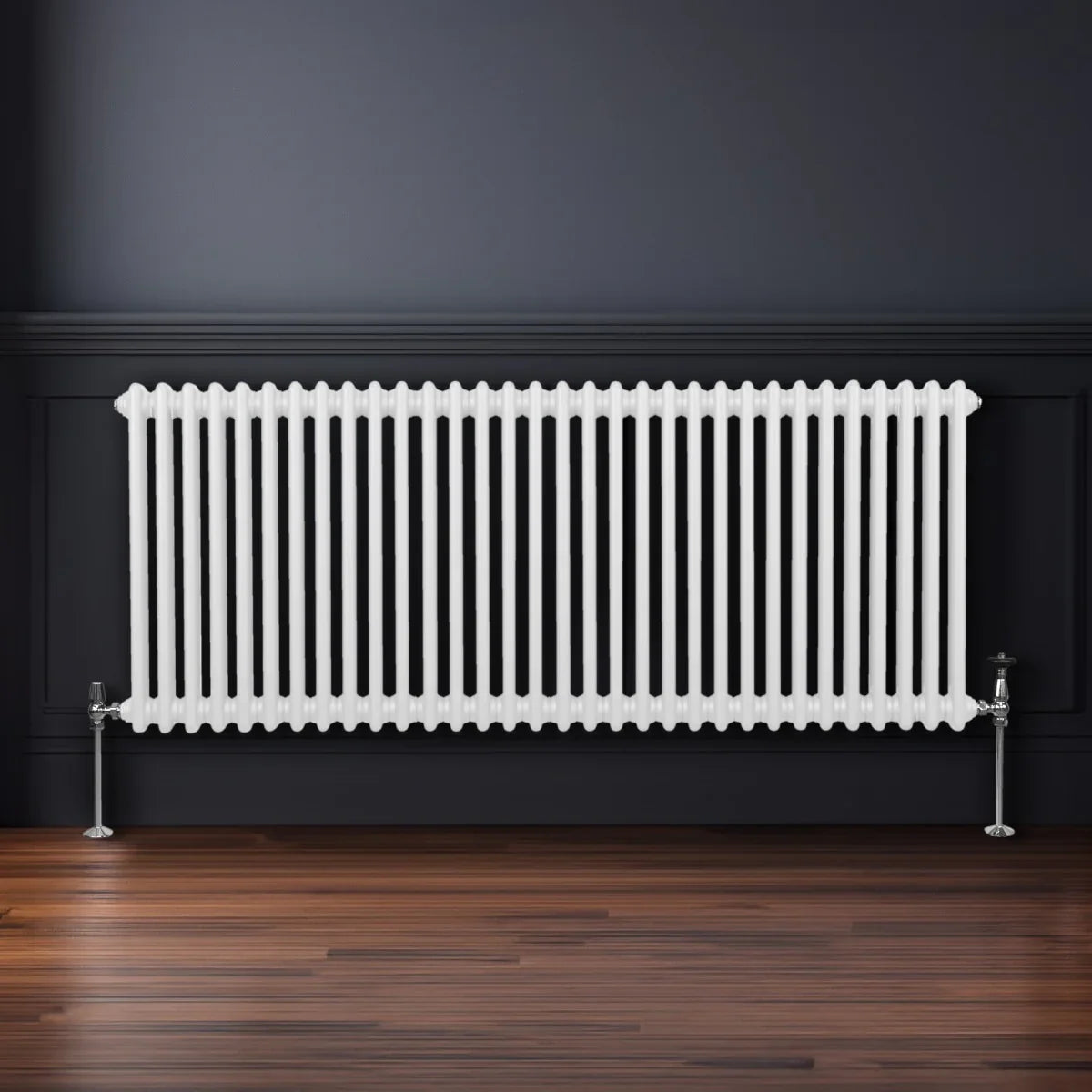Traditional 2 column radiator in white, 600 x 1462mm, featuring a sleek design with vertical fins and chrome valves against a dark wall