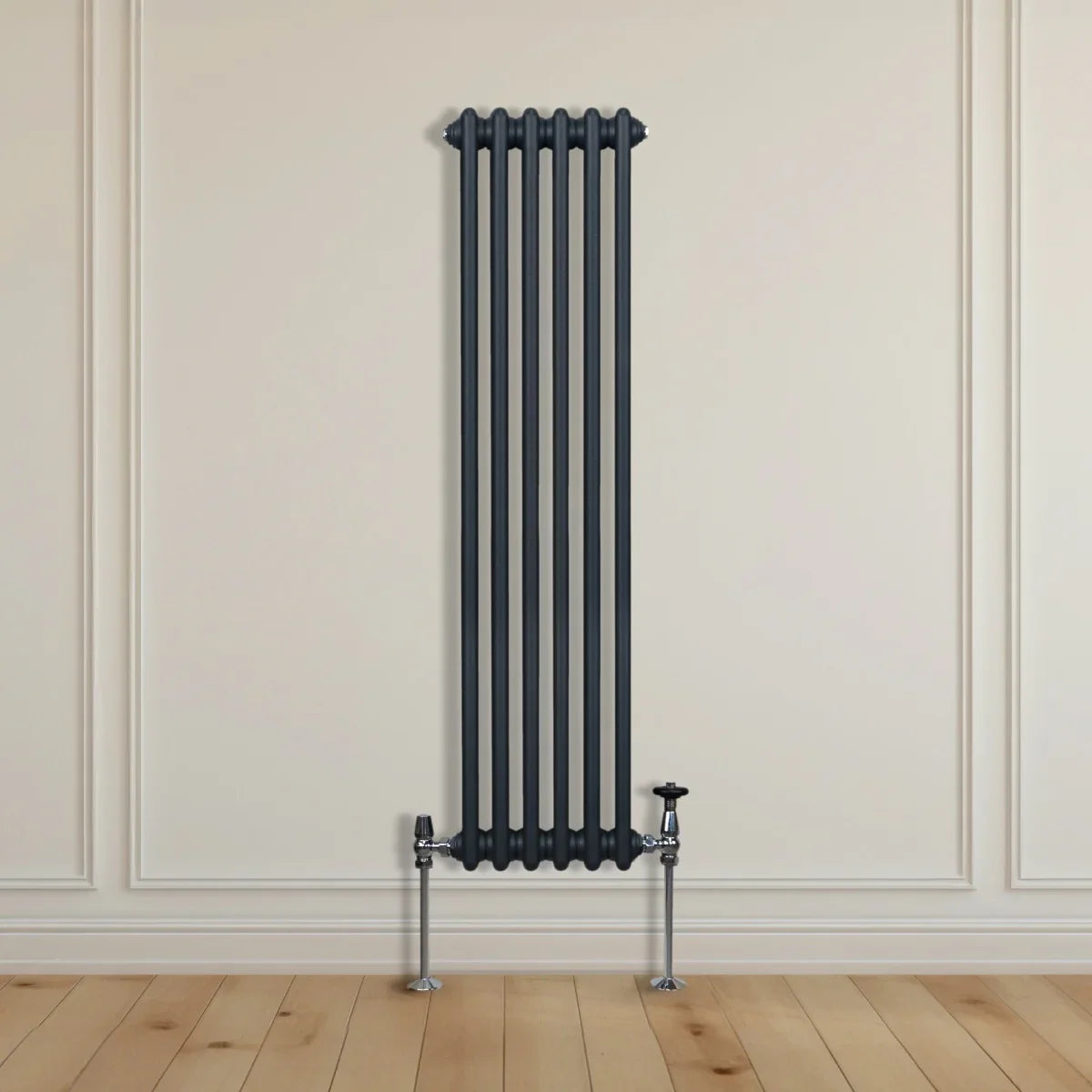 Traditional 2 column radiator in anthracite grey, 1500 x 292mm, featuring a sleek vertical design and polished chrome valves against a light wall