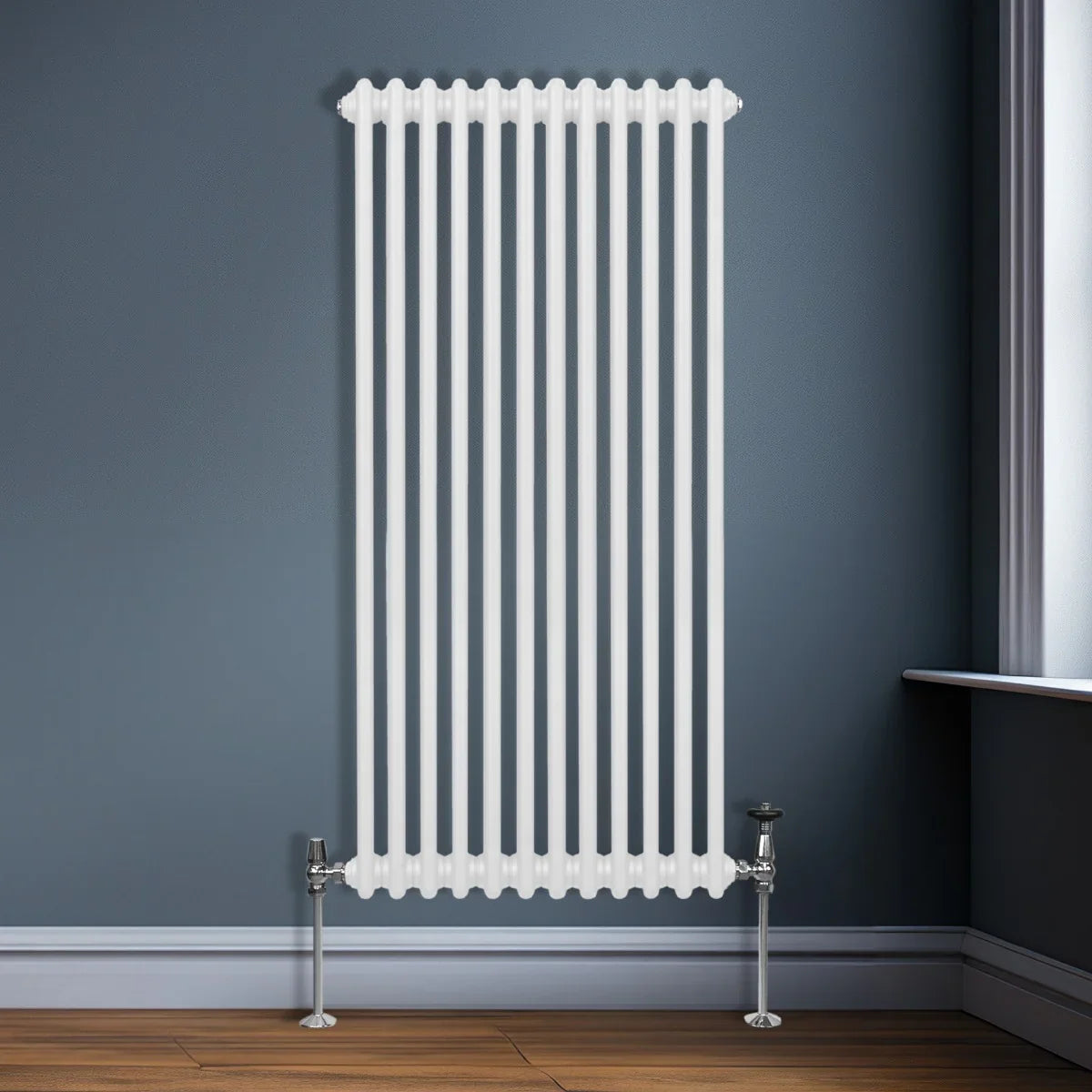 Traditional 2 column radiator in white, featuring a sleek vertical design with smooth, glossy finish, installed against a gray wall