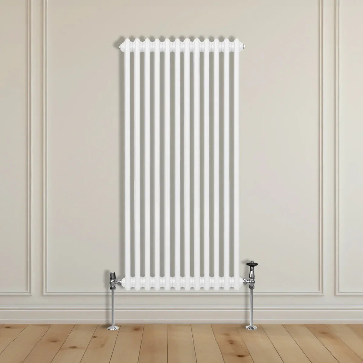 Traditional 2 column radiator in white, 1500 x 562mm, featuring a sleek vertical design and polished chrome valves against a light wall