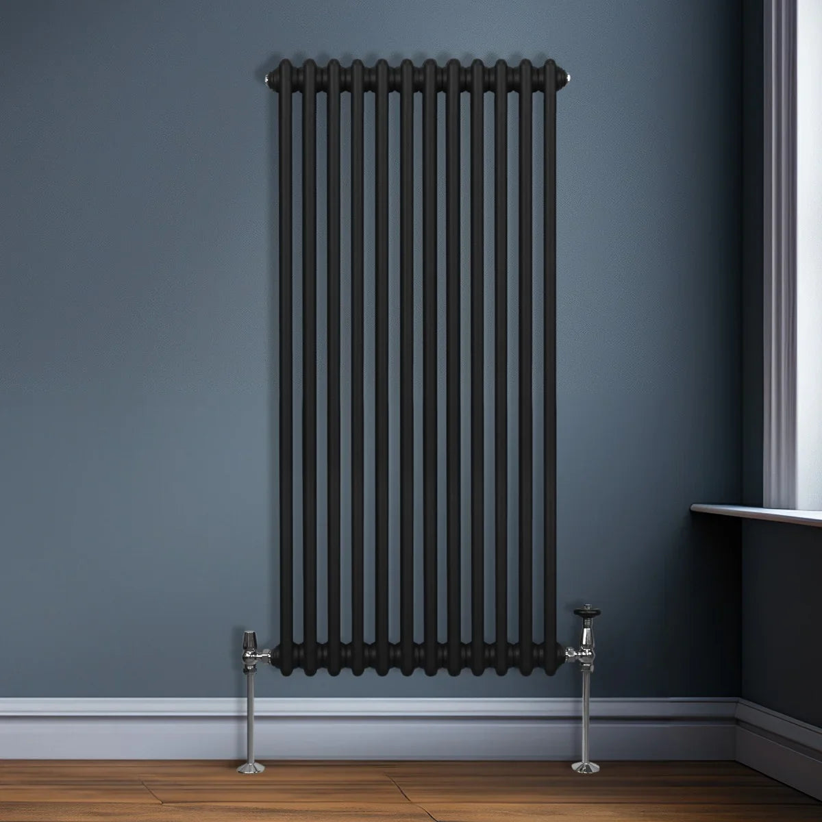 Traditional black 2 column radiator, 1500 x 562mm, featuring a sleek design with smooth, matte finish and chrome valves against a blue wall