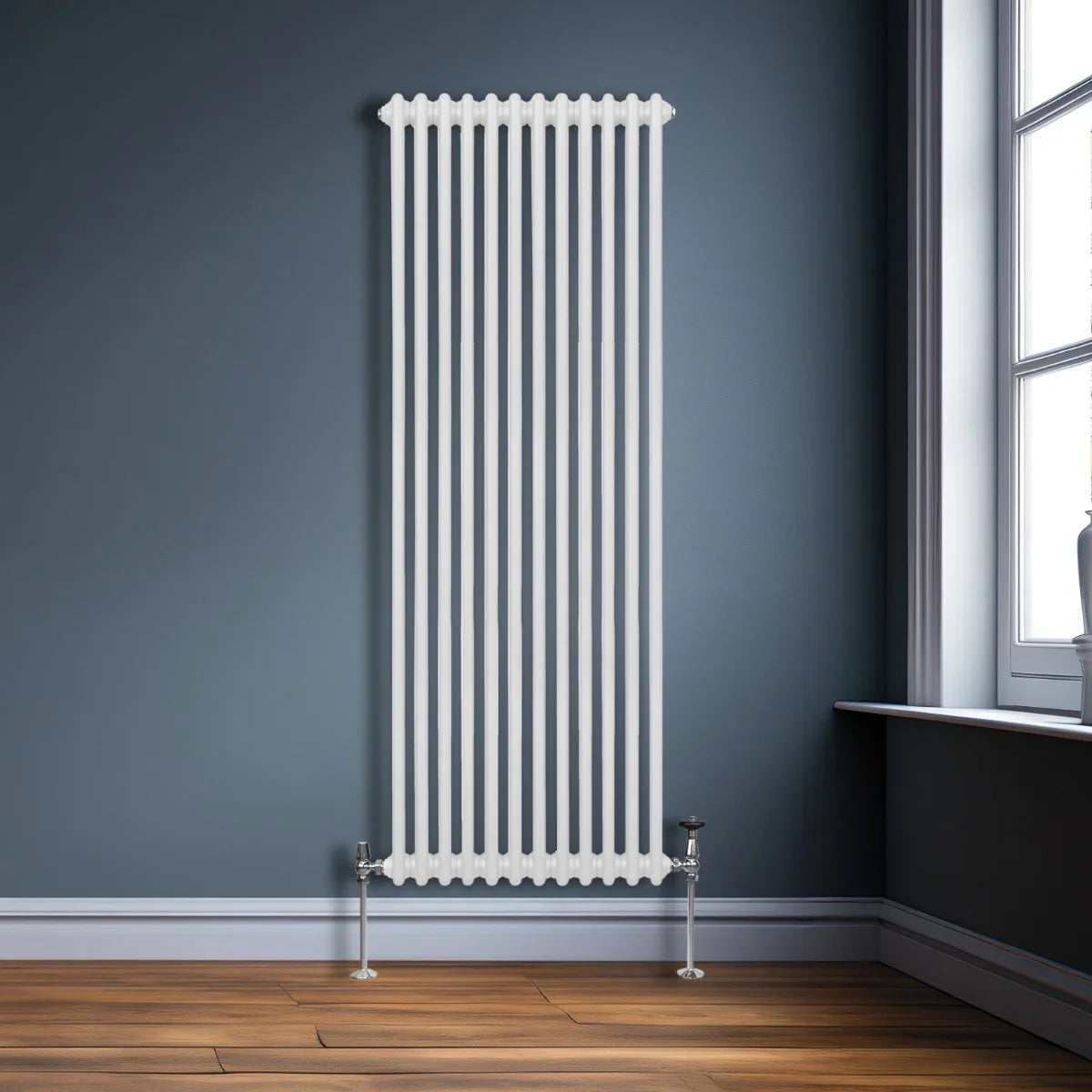 Traditional 2 column radiator in white, 1800 x 562mm, featuring a sleek vertical design against a dark blue wall and wooden floor