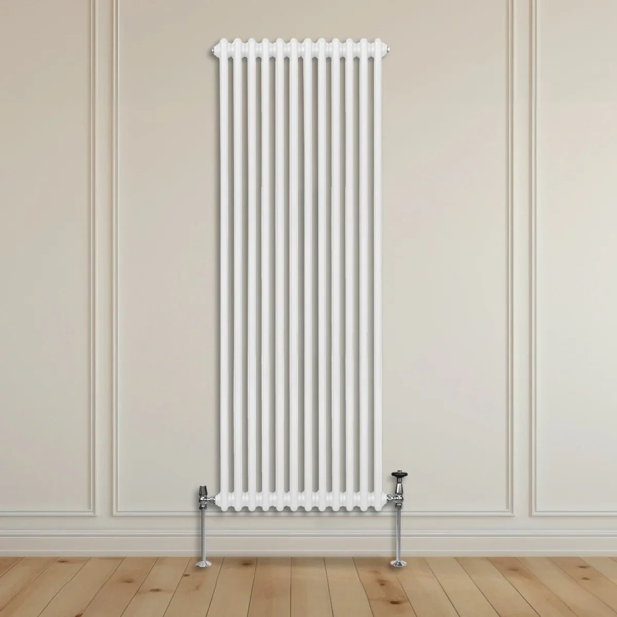 Traditional white 2 column radiator, 1800 x 562mm, featuring a sleek vertical design with polished chrome feet against a neutral wall