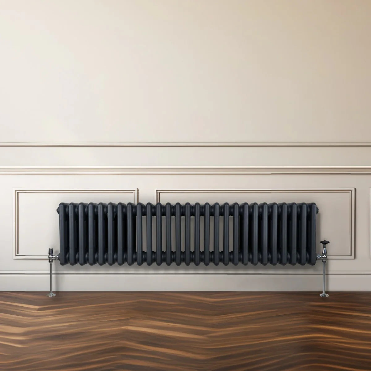 Traditional anthracite grey 3 column radiator, 300 x 1192mm, featuring a sleek design against a light wall and wooden floor