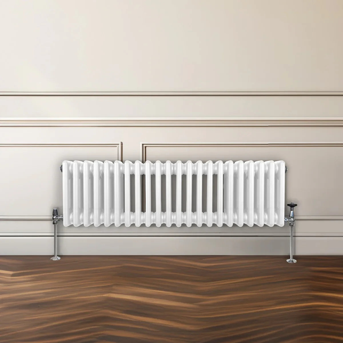 Traditional white 3 column radiator with a sleek design, featuring chrome valves, mounted against a neutral wall and wooden floor