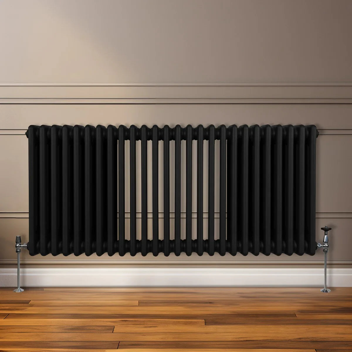 Traditional black 3 column radiator, 600 x 1192mm, featuring a sleek, textured finish, mounted on a stylish wooden floor against a neutral wall