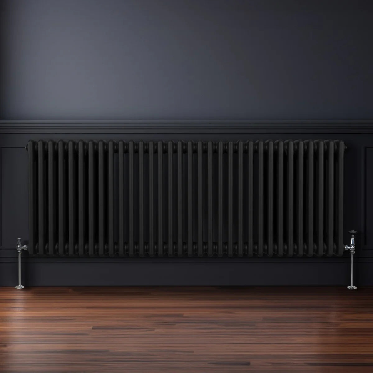 Traditional black 3 column radiator, 600 x 1462mm, featuring a sleek design with vertical bars, mounted on a wooden floor against a dark wall