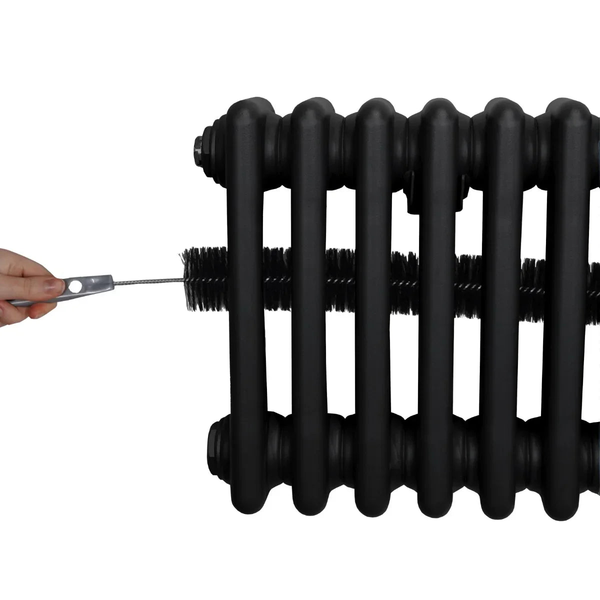 Traditional black 3 column radiator with a hand holding a cleaning brush, showcasing its sleek design and maintenance features