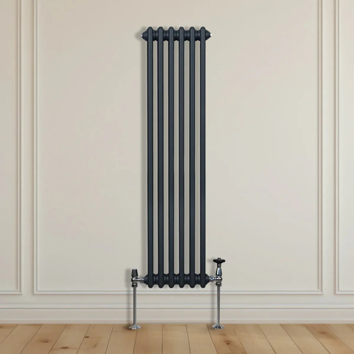 Traditional anthracite grey 3 column radiator, 1500 x 292mm, featuring a sleek vertical design and chrome valve accents against a light wall