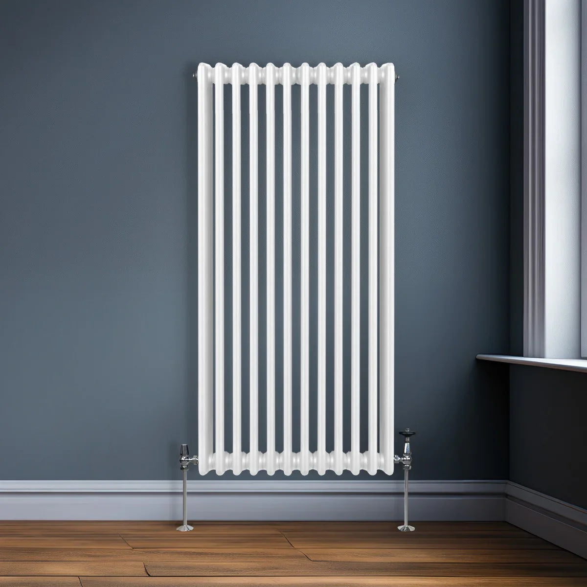 Traditional 3 column radiator in white, featuring a sleek design with vertical lines, mounted on a wall in a modern room setting