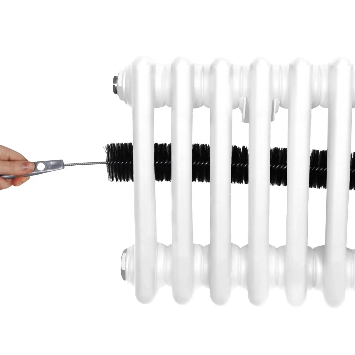 Traditional white 3 column radiator with a hand adjusting the valve, showcasing its sleek design and sturdy construction