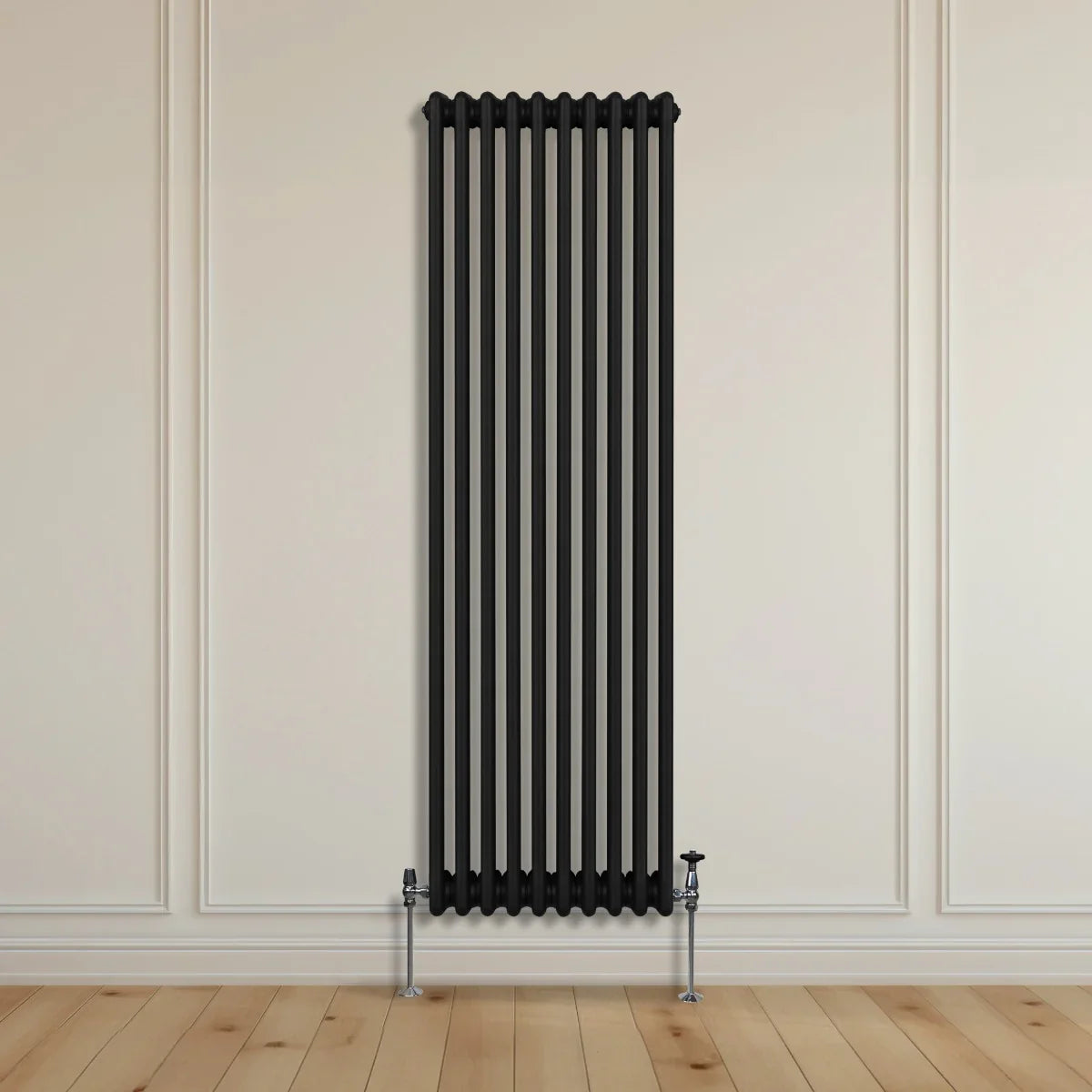 Traditional black 3 column radiator, 1800 x 472mm, featuring a sleek vertical design and polished chrome valves against a neutral wall