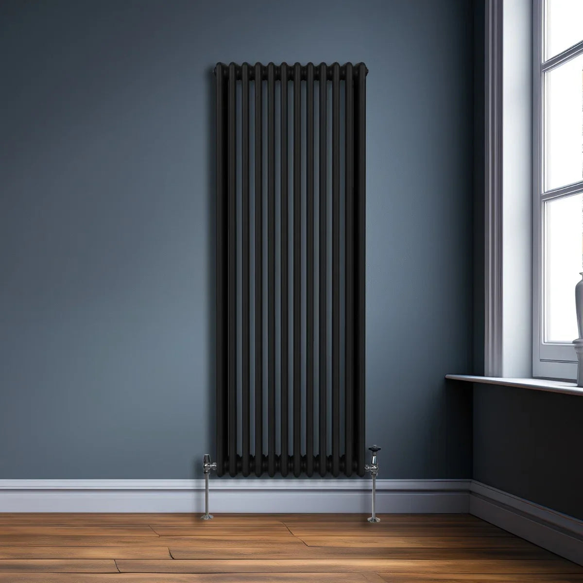 Traditional black 3 column radiator, 1800 x 562mm, featuring a sleek design with vertical lines, mounted on a wall in a modern room