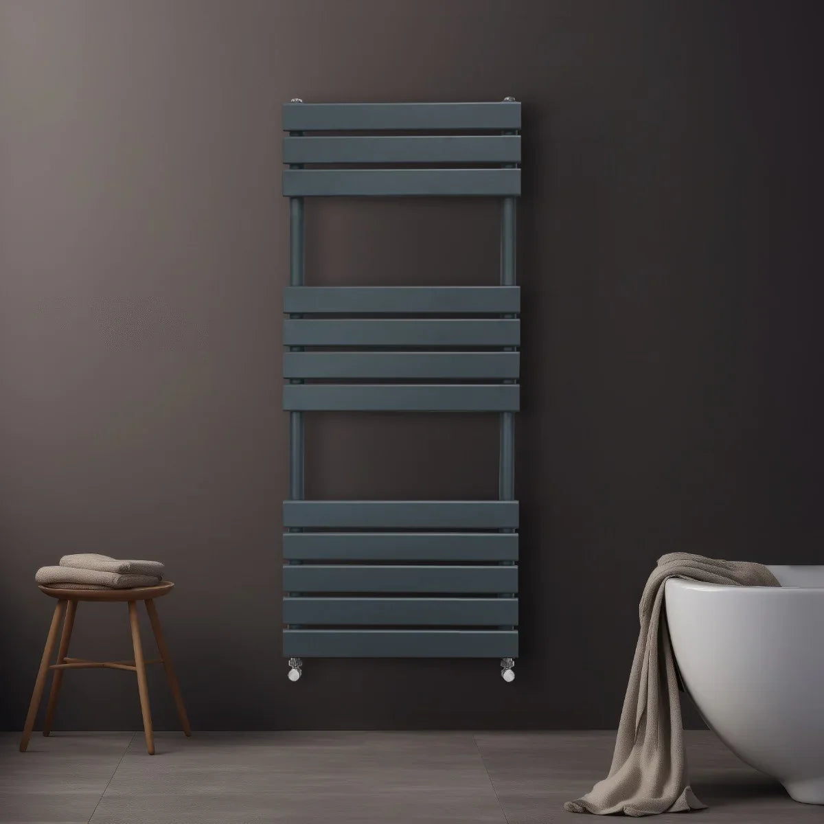 Flat panel towel radiator in anthracite grey, featuring sleek horizontal slats, mounted on a dark wall, with a cozy towel draped nearby