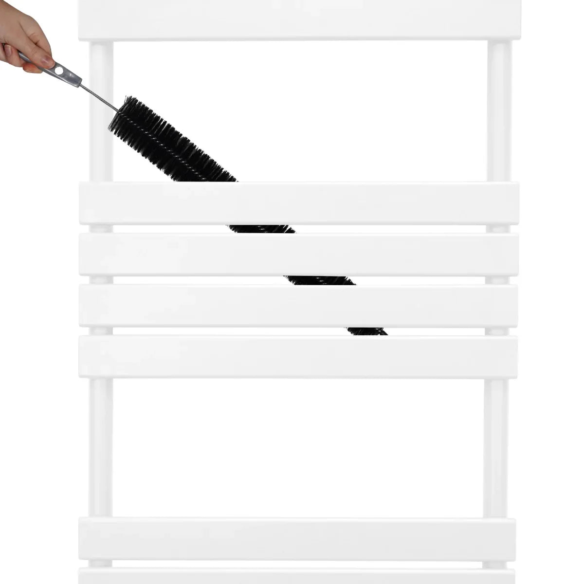 White flat panel towel radiator with sleek lines, featuring a hand using a black cleaning brush to maintain its surface