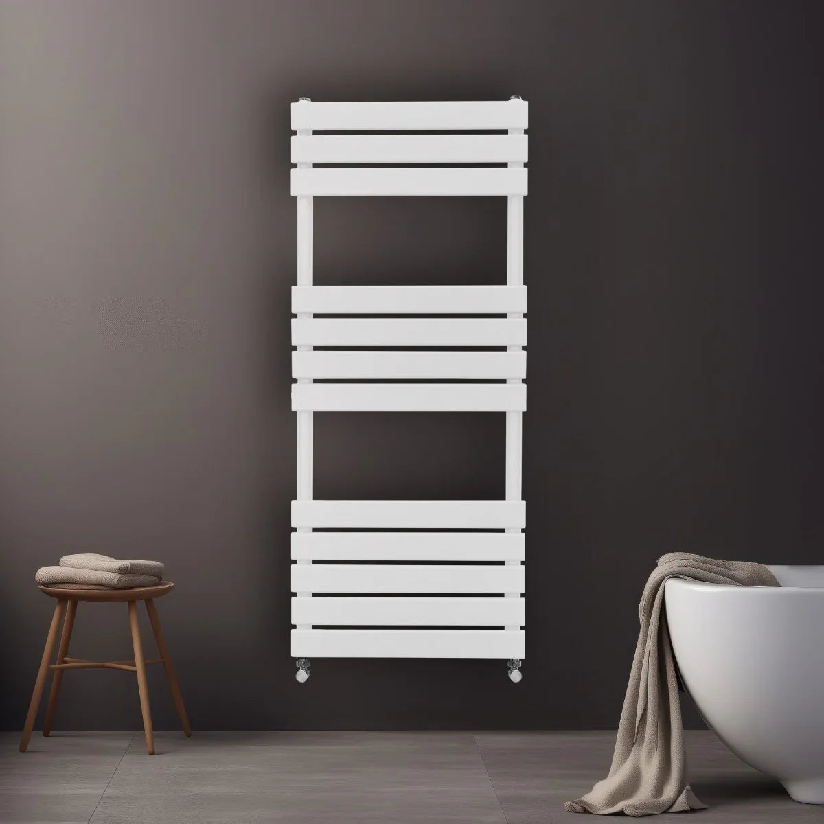 Flat panel towel radiator in white, 1200mm x 450mm, featuring sleek horizontal slats, mounted on a dark wall with a cozy towel draped nearby