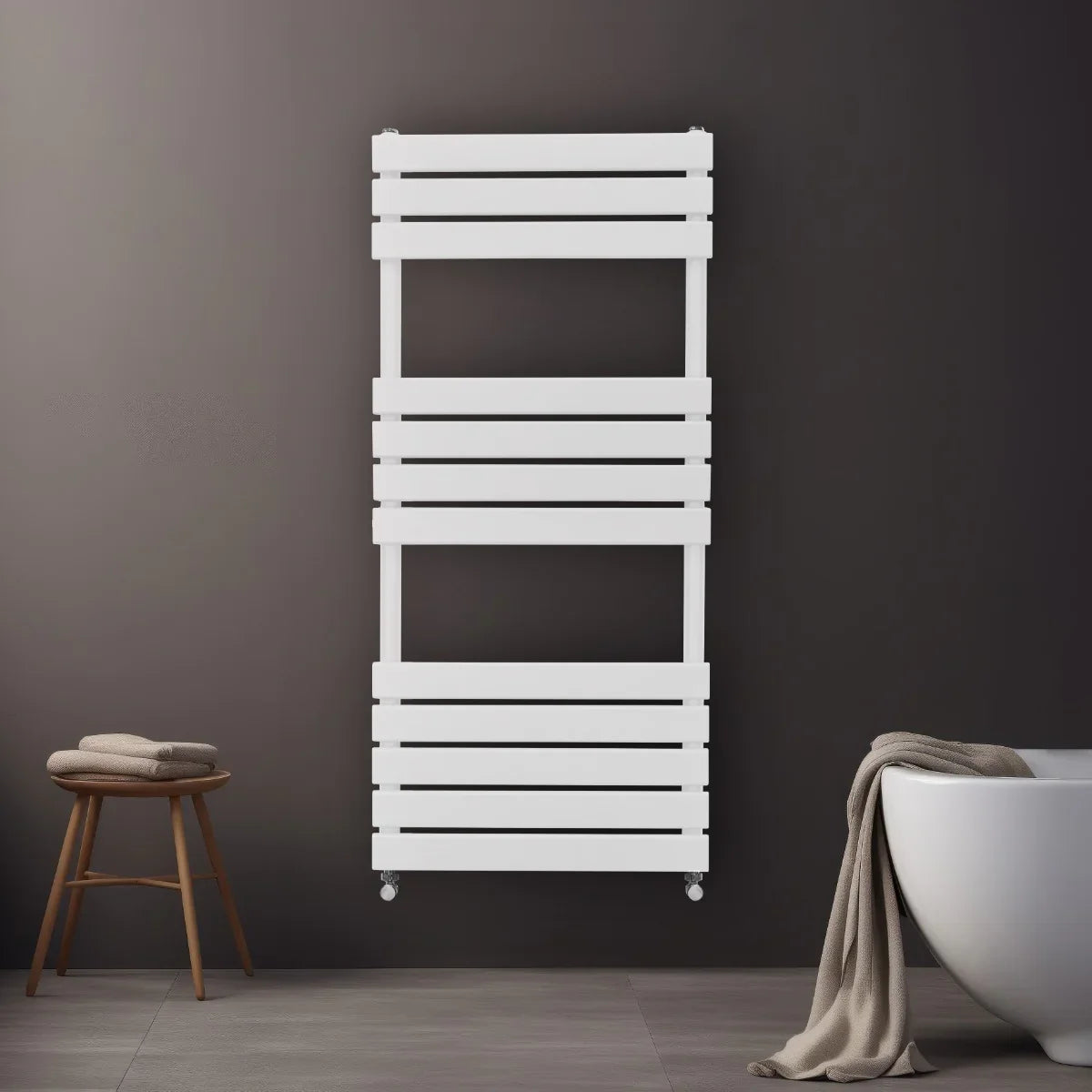 Flat panel towel radiator in white, 1200mm x 500mm, featuring sleek horizontal slats, mounted on a dark wall with a cozy towel draped nearby