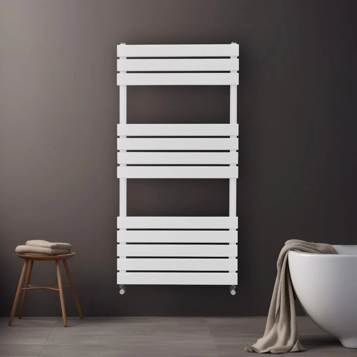 Flat panel towel radiator in white, 1200mm x 600mm, featuring sleek horizontal slats, mounted on a dark wall with a towel and stool nearby