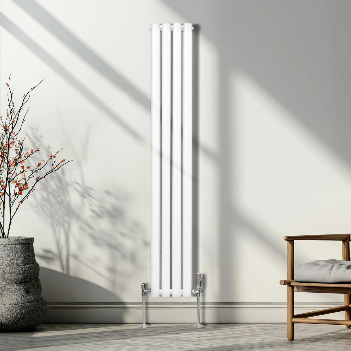 Chrome thermostatic radiator valves with sleek design, polished finish, and modern aesthetic, complementing a tall white radiator in a stylish interior