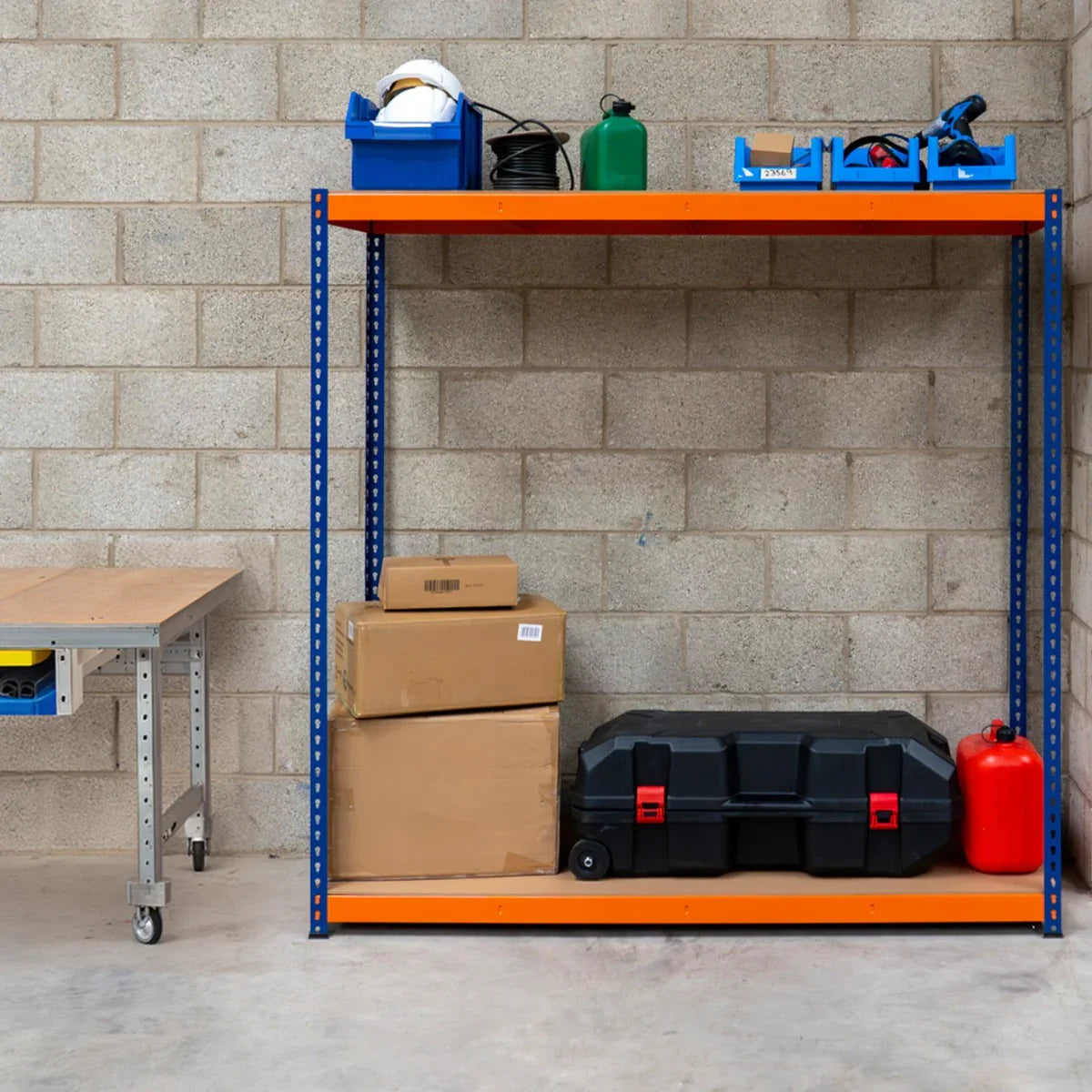S-Rax 2 Shelf Racking in blue and orange, featuring sturdy metal construction, with boxes and tools neatly organized on shelves