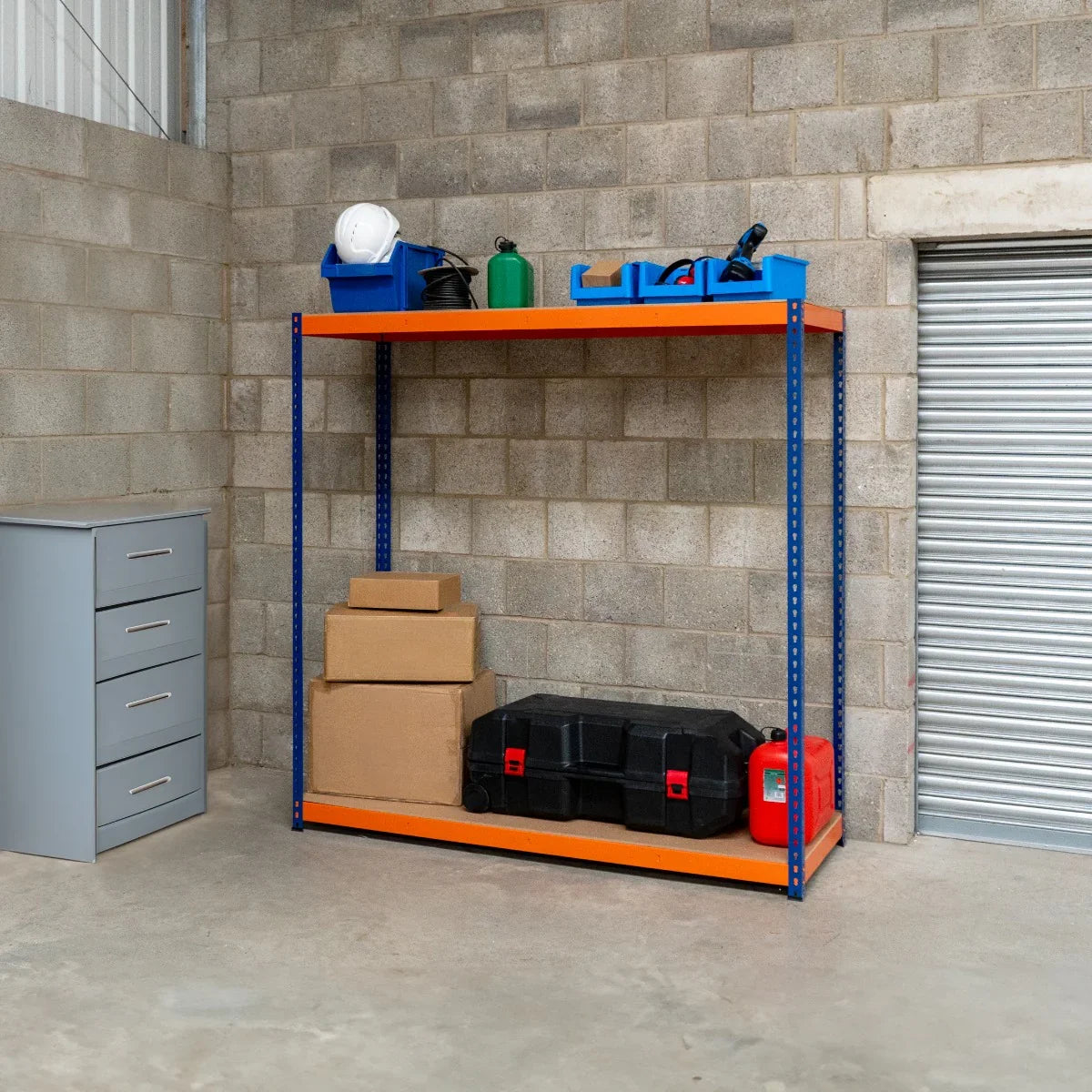 S-Rax 2 Shelf Racking in blue and orange, featuring sturdy metal construction, with tools and storage boxes organized on shelves