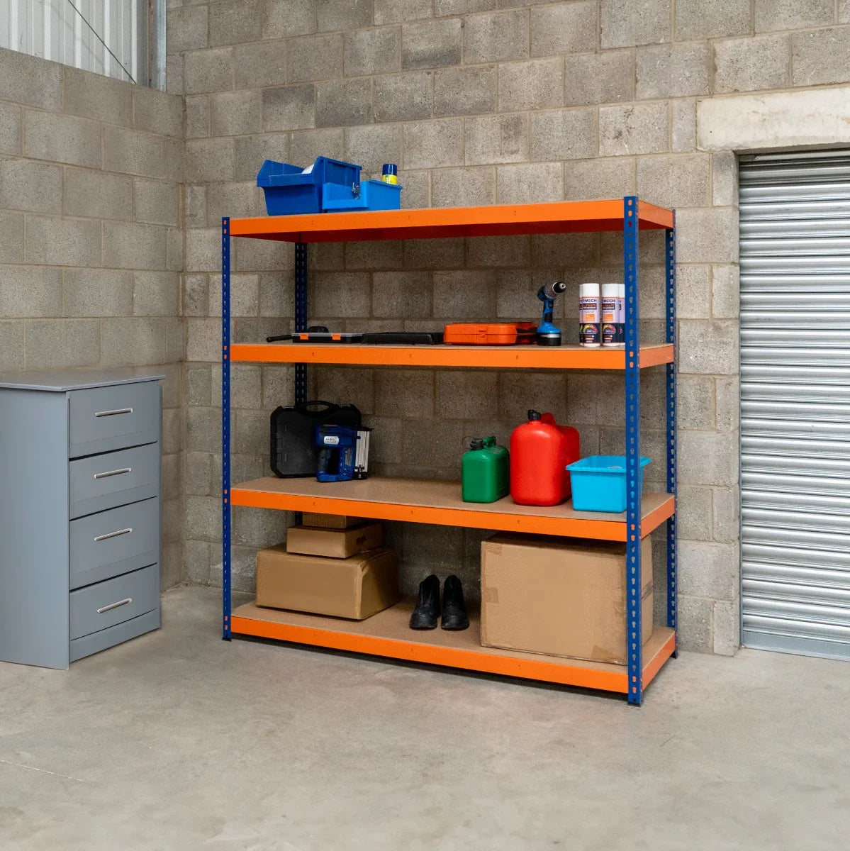 S-Rax 4 Shelf Racking in blue and orange, featuring sturdy metal construction, four spacious shelves, and organized storage items