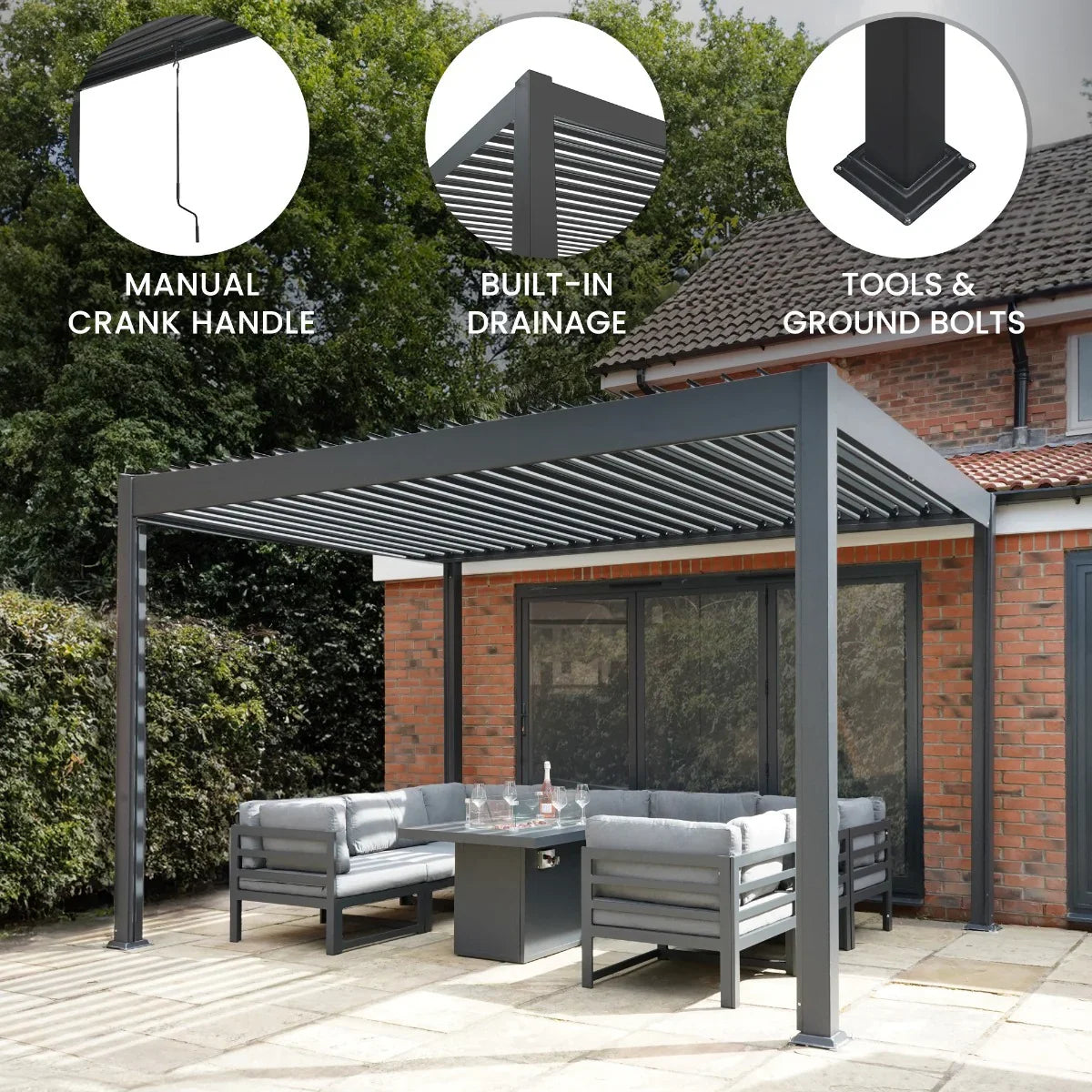 Anthracite aluminium pergola measuring 3m x 4m with a manual crank handle, built-in drainage, and stylish outdoor seating area