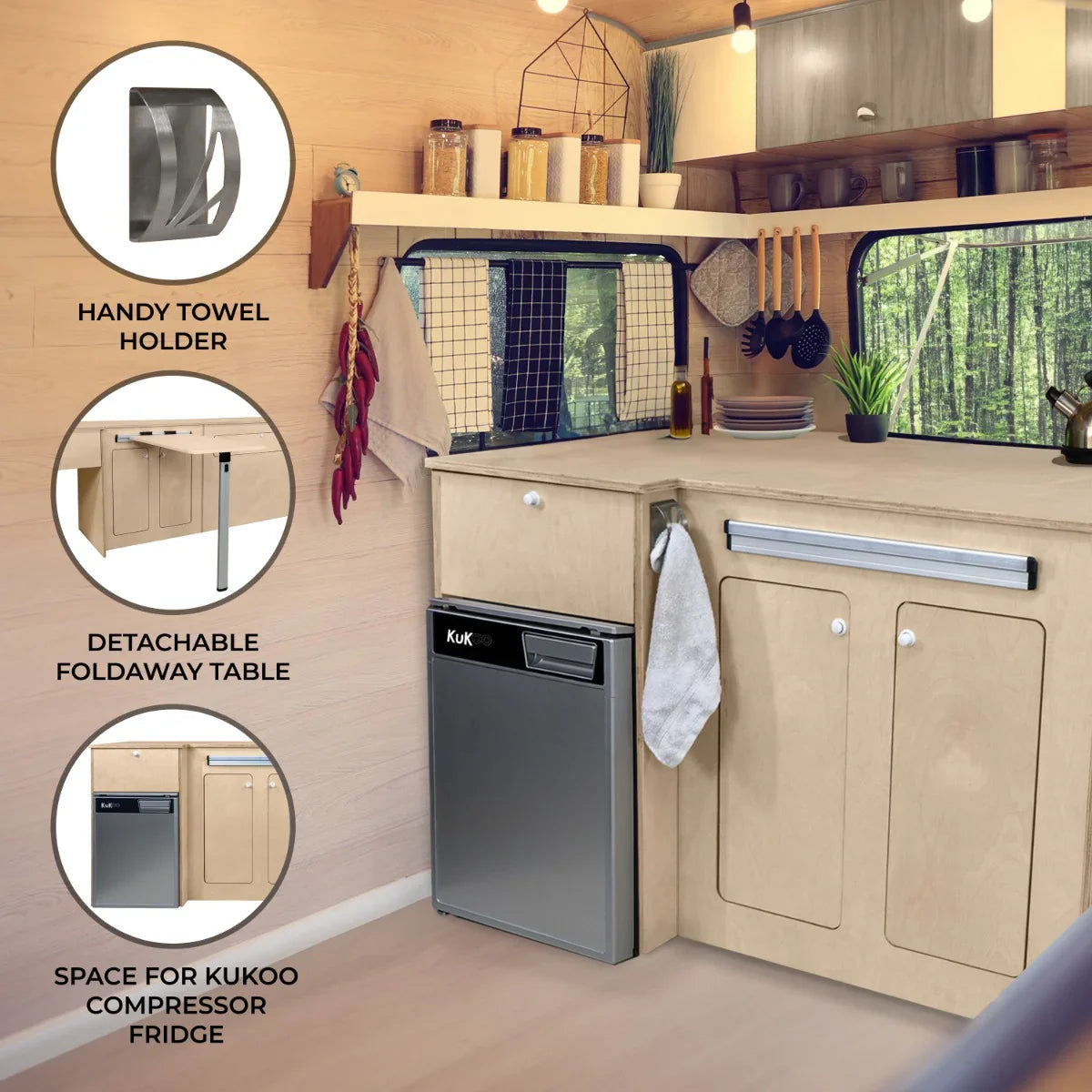 Camper kitchen pod featuring a silver compressor fridge, wooden cabinetry, detachable foldaway table, and towel holder in a cozy interior setting